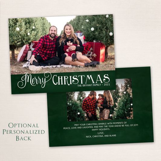 Merry Christmas family photo card with green background and personalized text in elegant white script.