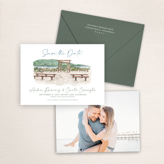 Custom watercolor Save the Date card featuring hand-painted illustration of Grand Lake Lodge in Grand Lake, Colorado, personalized wedding stationery with elegant venue artwork with matching envelope.
