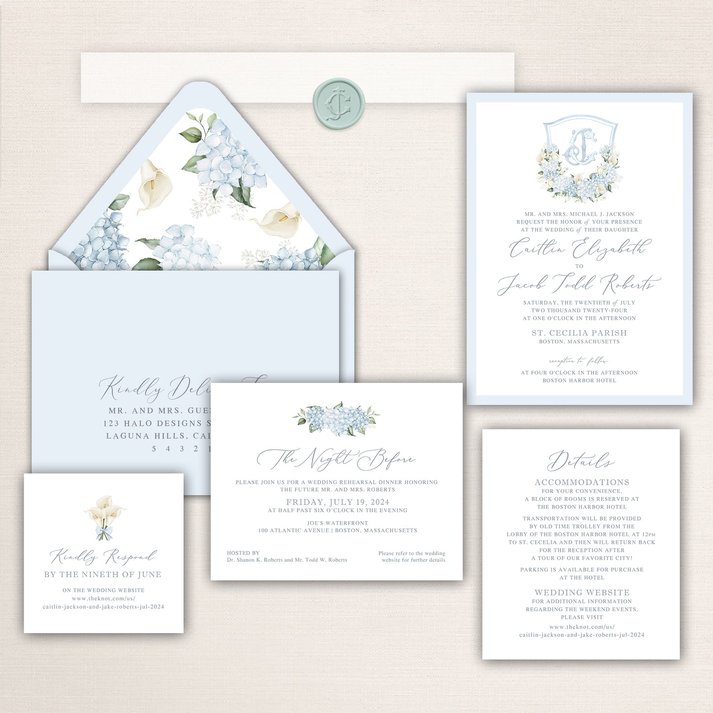 Wedding invitation suite with blue hydrangea and calla lily floral artwork, custom crest design, and matching envelope liner.
