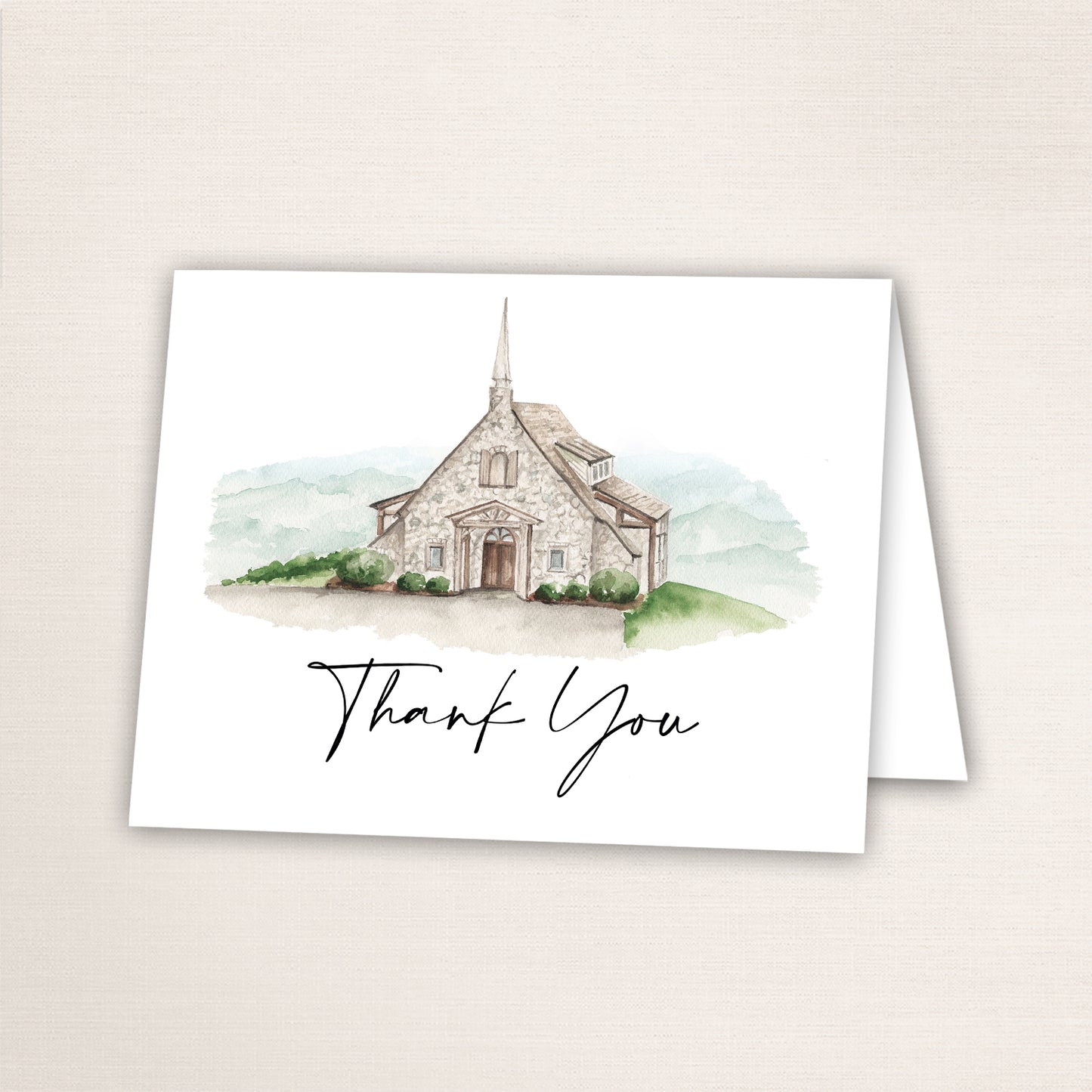 Folded thank you card featuring a hand-painted South Carolina wedding venue watercolor and “Thank You” text in script on the front.