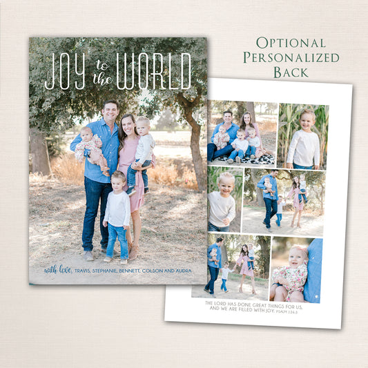 Family portrait outdoors surrounded by trees with the phrase “Joy to the World” in white script, shown with an optional personalized back featuring a photo collage and Bible verse.