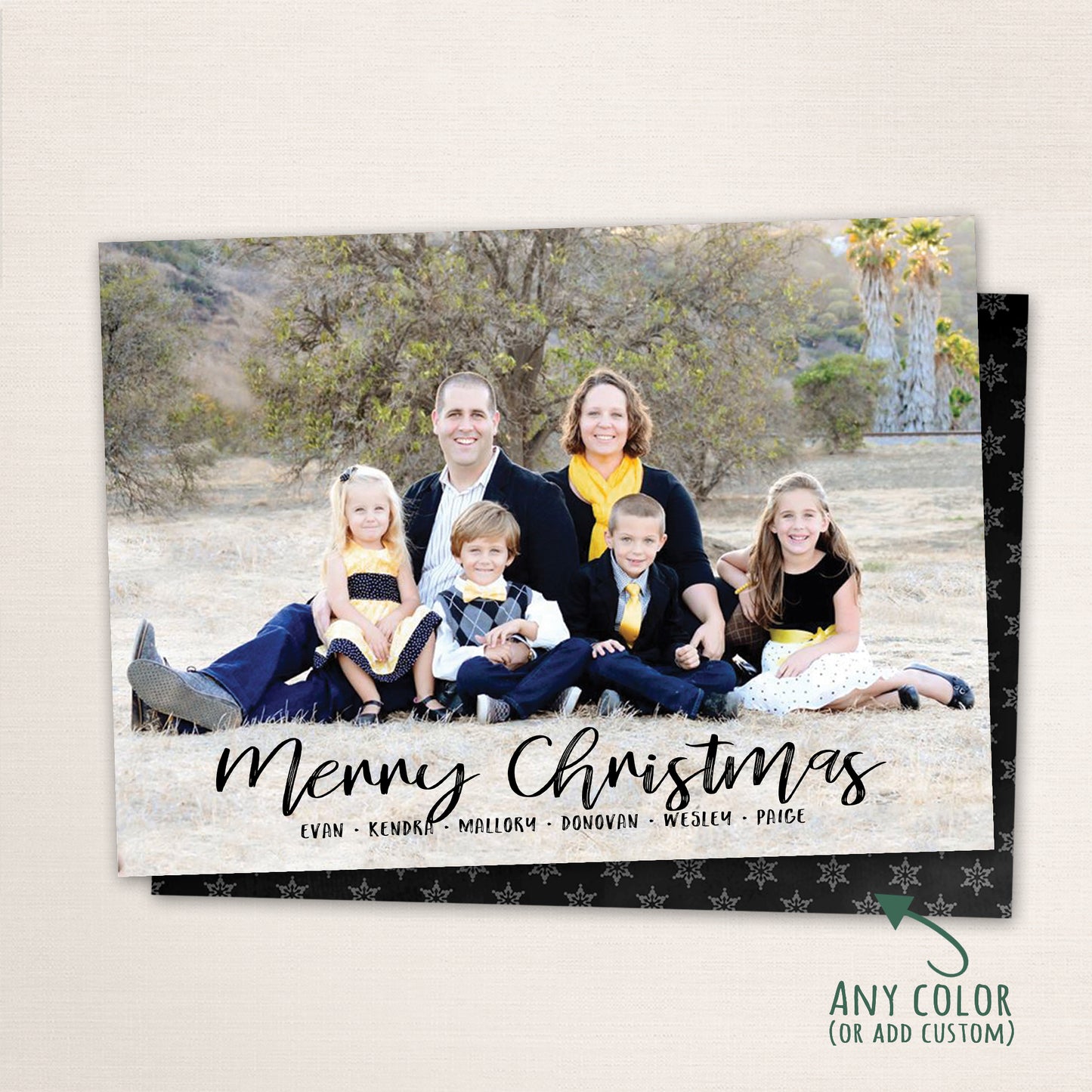 Family photo Christmas card with elegant “Merry Christmas” script and customizable text over a full-photo layout.