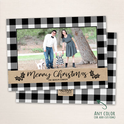 Rustic buffalo plaid Christmas photo card with black and white checkered border, handwritten Merry Christmas text, and kraft-style accent strip.