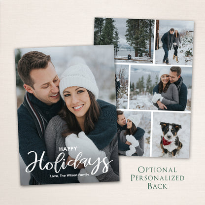 Snowy winter holiday photo card featuring a couple in cozy winter attire with “Happy Holidays” script, personalized text, and multi-photo collage back.