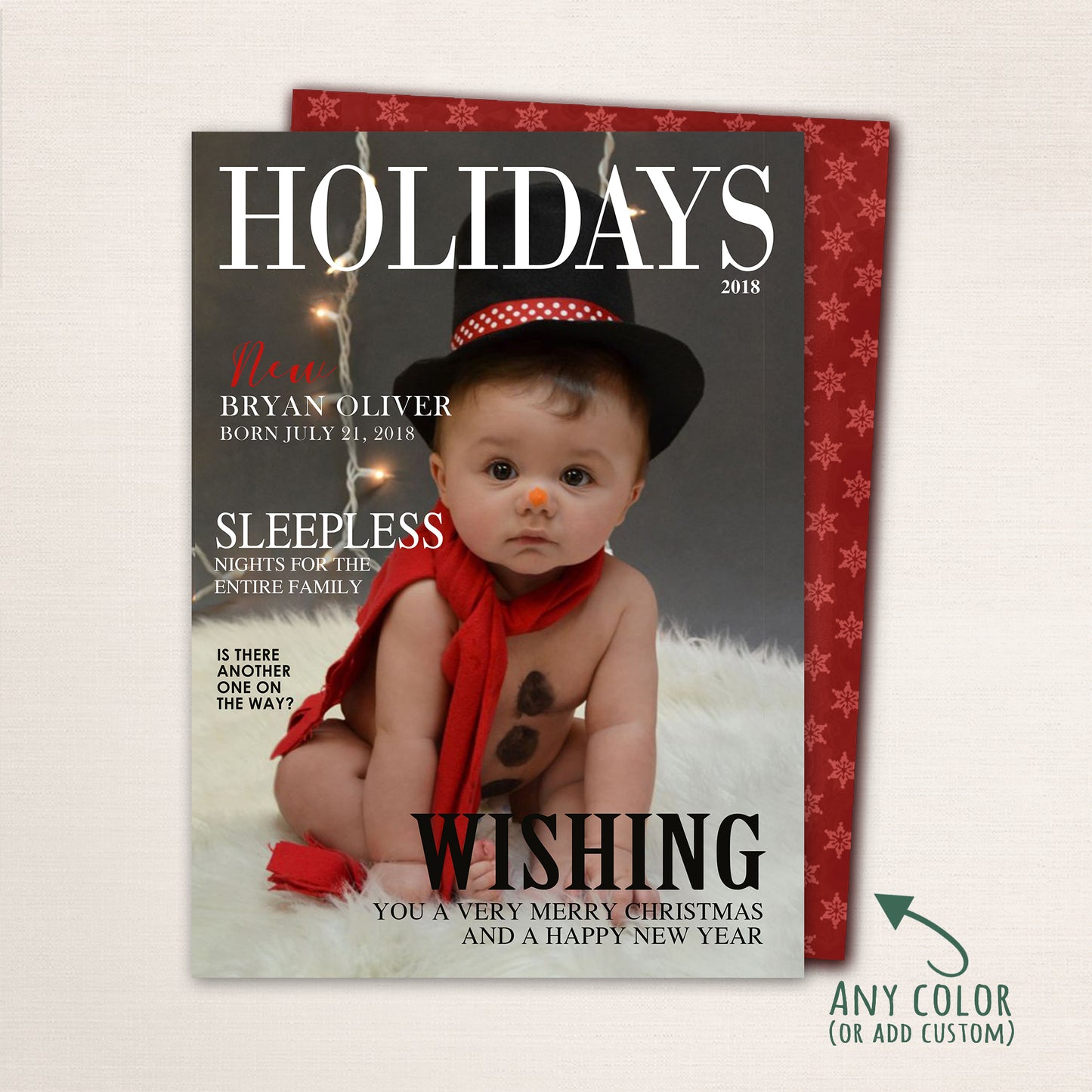 Holiday magazine cover card with baby in snowman outfit and red scarf, featuring playful text and customizable details.