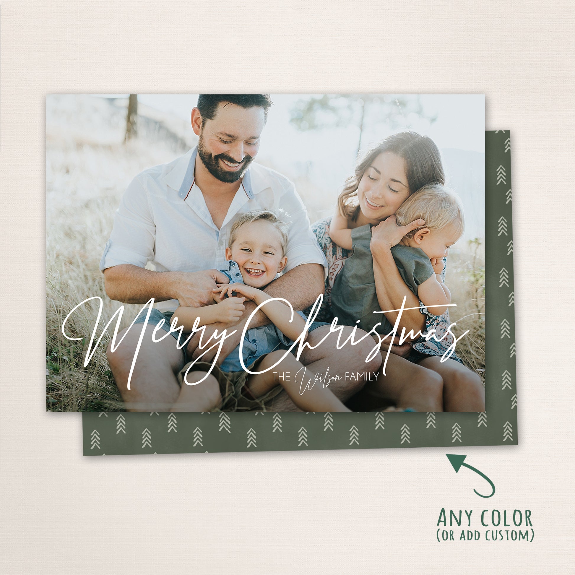 Horizontal Merry Christmas photo card with handwritten script typography, customizable text, with a mini tree pattern on the back.