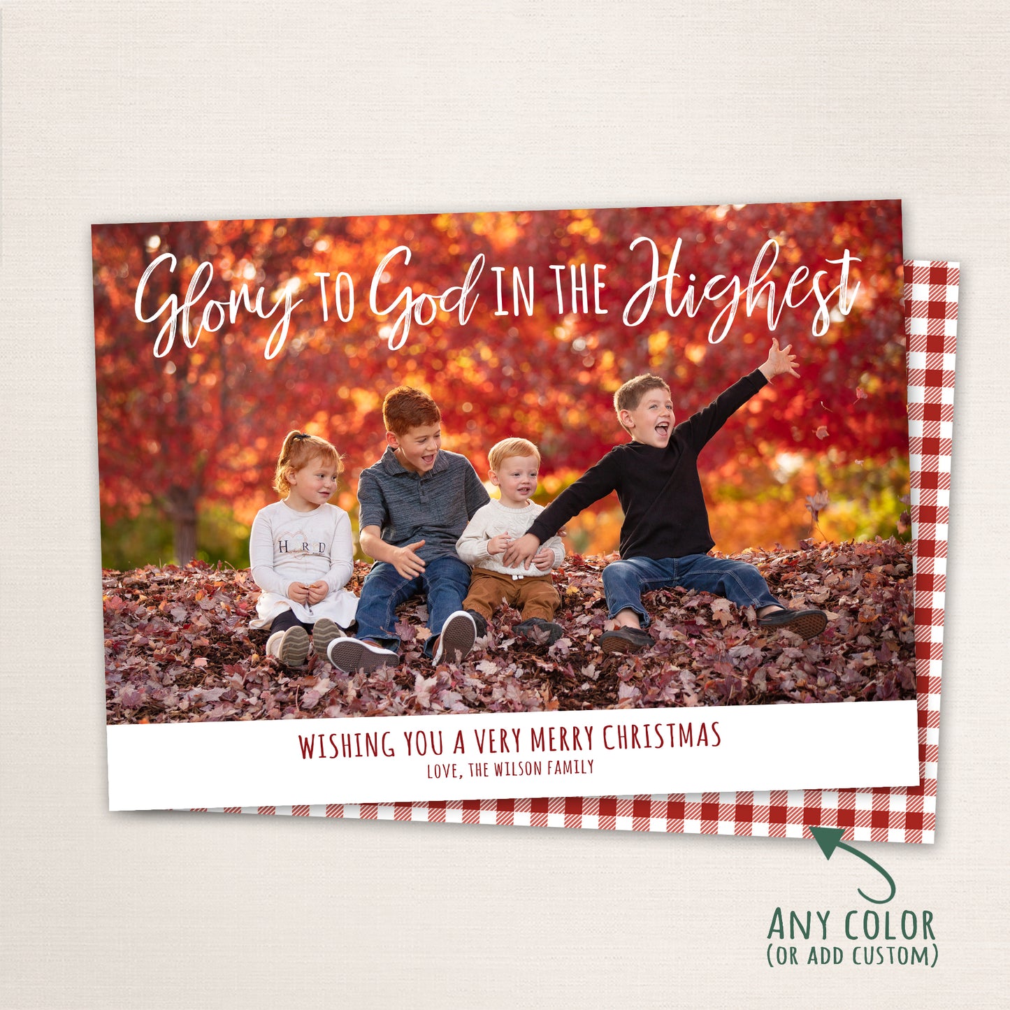 Christian family photo Christmas card with “Glory to God in the Highest” message, classic full-photo layout, and the back has a plaid pattern.