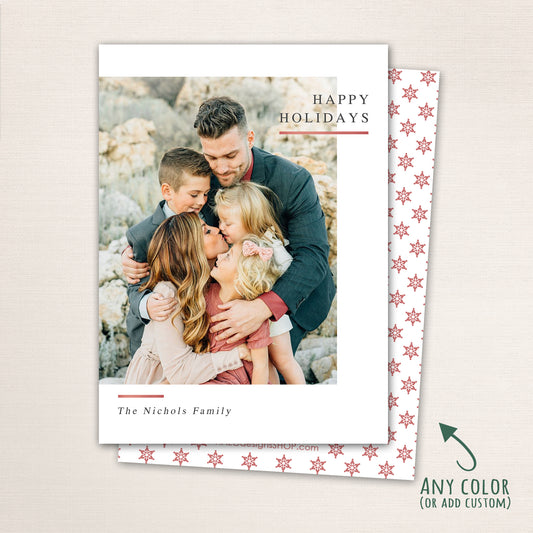 Modern minimalist holiday photo card with “Happy Holidays” text, full-family photo, white border, and optional red snowflake-patterned back customizable in any color.