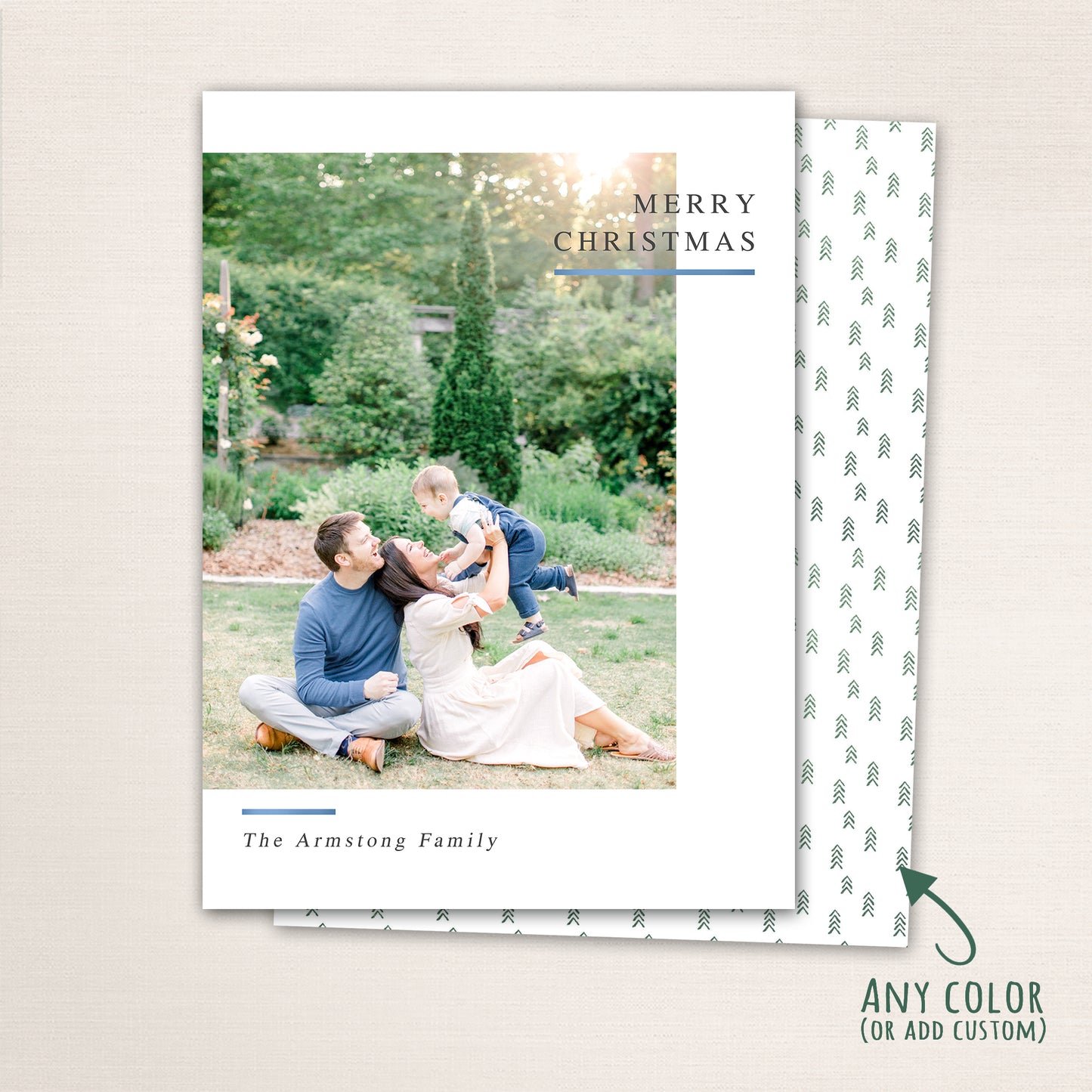 Vertical modern minimalist holiday photo card with “Merry Christmas” text, full-family photo, white border, and optional red snowflake-patterned back customizable in any color.