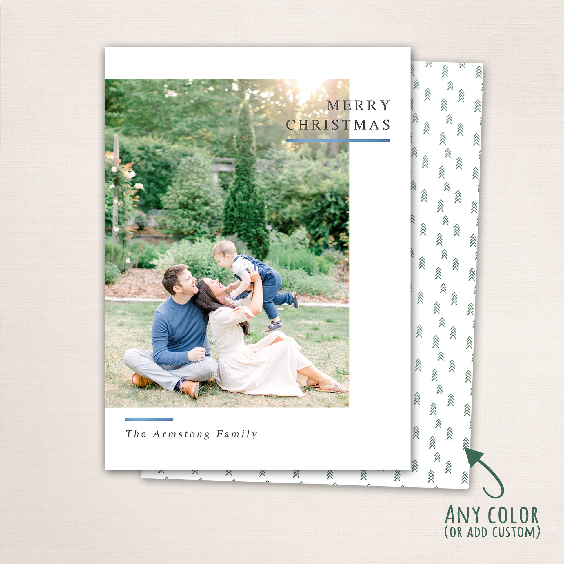 Vertical modern minimalist holiday photo card with “Merry Christmas” text, full-family photo, white border, and optional red snowflake-patterned back customizable in any color.