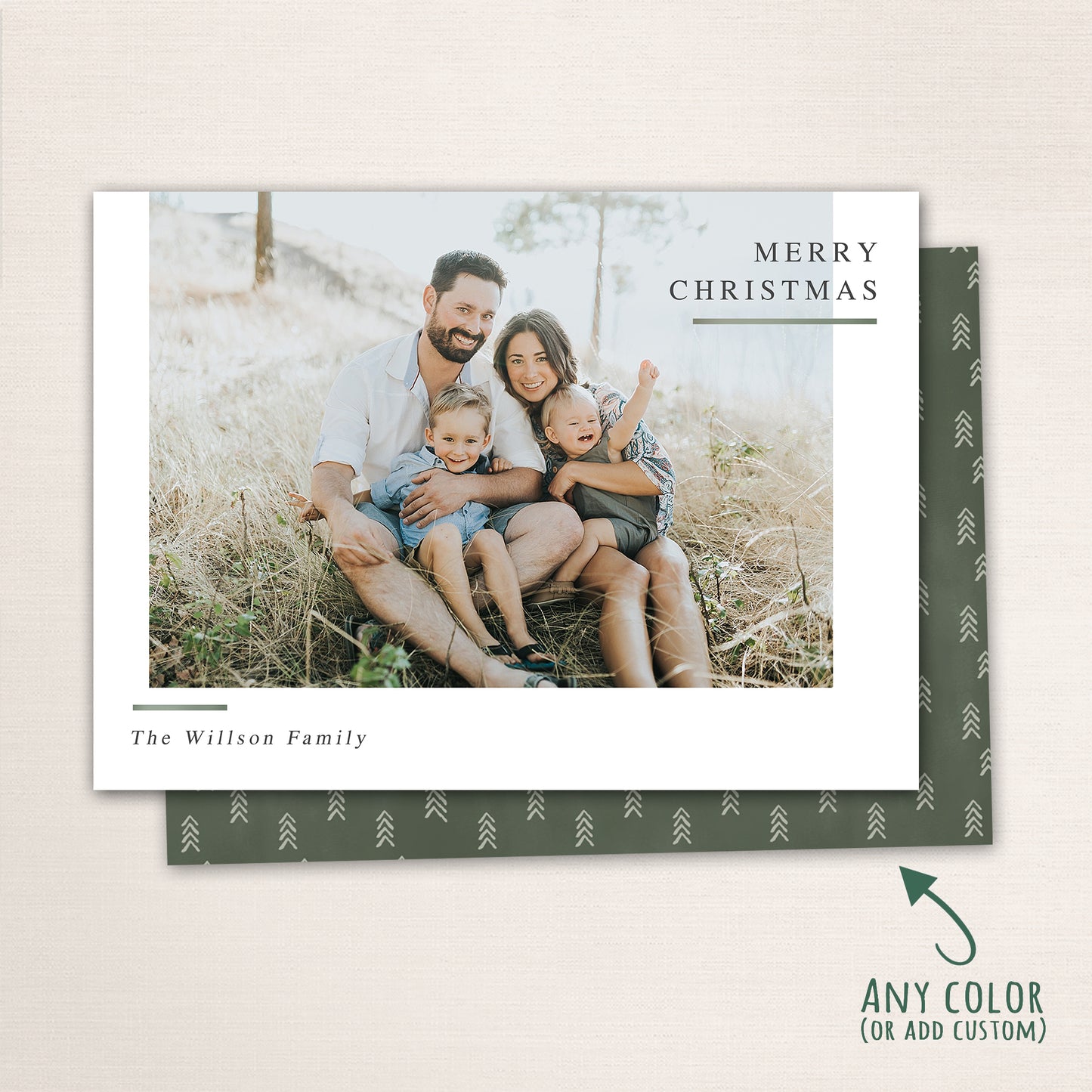 Horizontal modern minimalist holiday photo card with “Merry Christmas” text, full-family photo, white border, and optional red snowflake-patterned back customizable in any color.