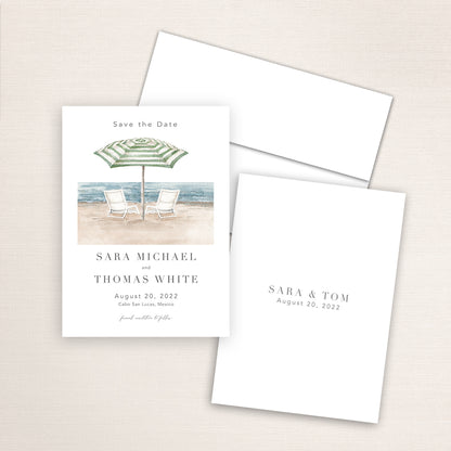 Custom watercolor Save the Date card featuring hand-painted venue illustration of beach chairs and parasol in Manursing Island, New York personalized wedding stationery with elegant venue artwork. 