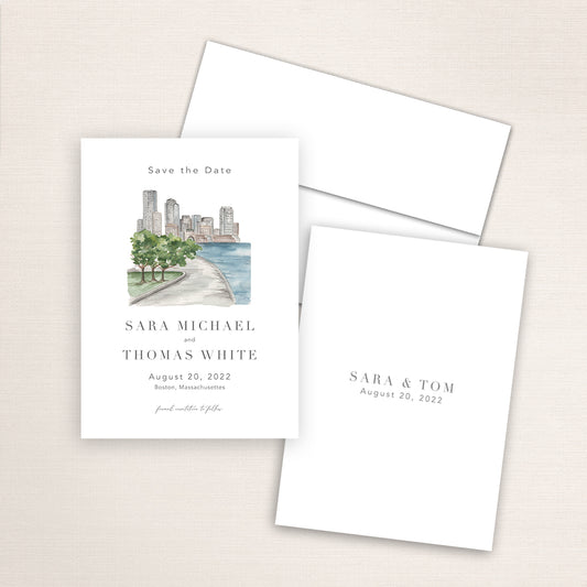 Custom watercolor Save the Date card featuring hand-painted venue illustration of Boston Harbor in Boston, Massachusetts personalized wedding stationery with elegant venue artwork. 