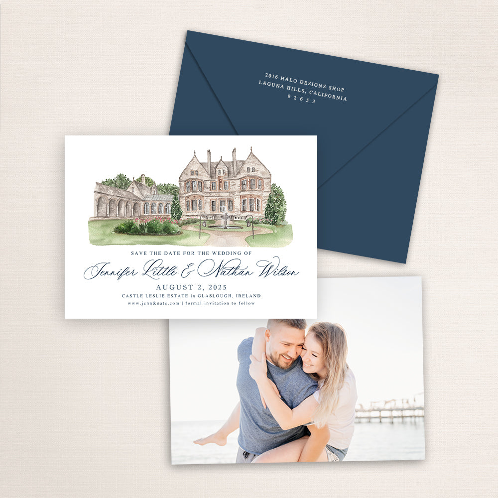 Castle Leslie Estate Ireland save the date featuring a hand-painted watercolor illustration of the historic castle and gardens in Glaslough, navy envelope, elegant script names, and engagement photo on the back.
