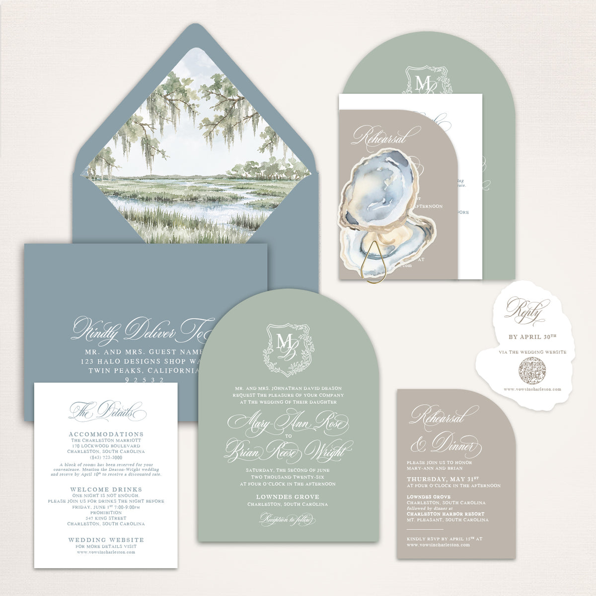 Dusty blue and sage Charleston wedding invitation suite with custom watercolor marsh envelope liner, oyster shell artwork, arched monogram invitation, rehearsal dinner card, details card, and deckle edge QR code RSVP for an elegant Lowcountry wedding.