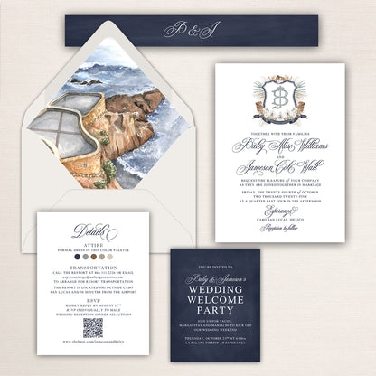 Luxury Cabo San Lucas wedding invitation suite featuring elegant navy and white typography, ornate monogram crest invitation card, watercolor ocean cliff envelope liner inspired by Esperanza Resort, wedding details card with QR code and color palette icons, navy welcome party card, and coordinated navy belly band with monogram initials.