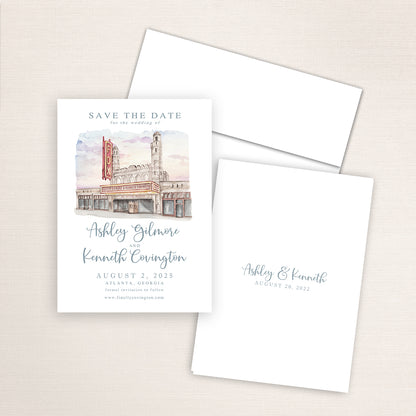 Fox Theatre save the date with detailed watercolor artwork of the Atlanta landmark, refined wedding typography layout, white envelope, and minimalist printed back with couple’s names and wedding date.