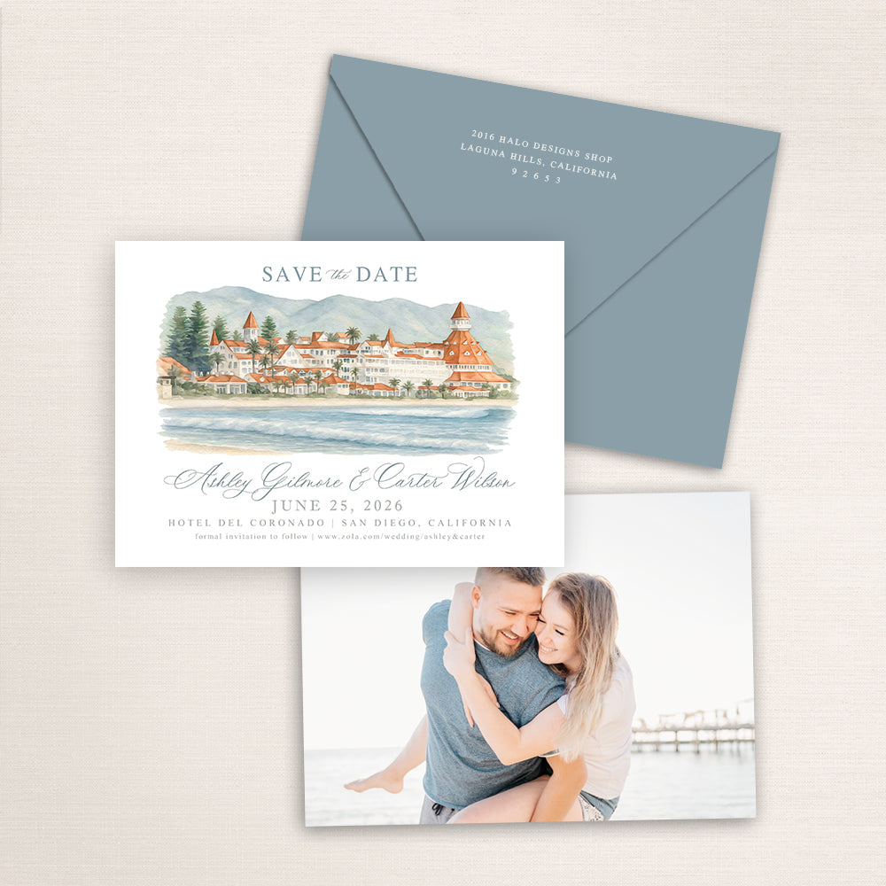 Hotel del Coronado save the date with hand-painted watercolor illustration of the iconic red-roofed San Diego beachfront resort, soft coastal tones, coordinating envelope, and engagement photo on the back.