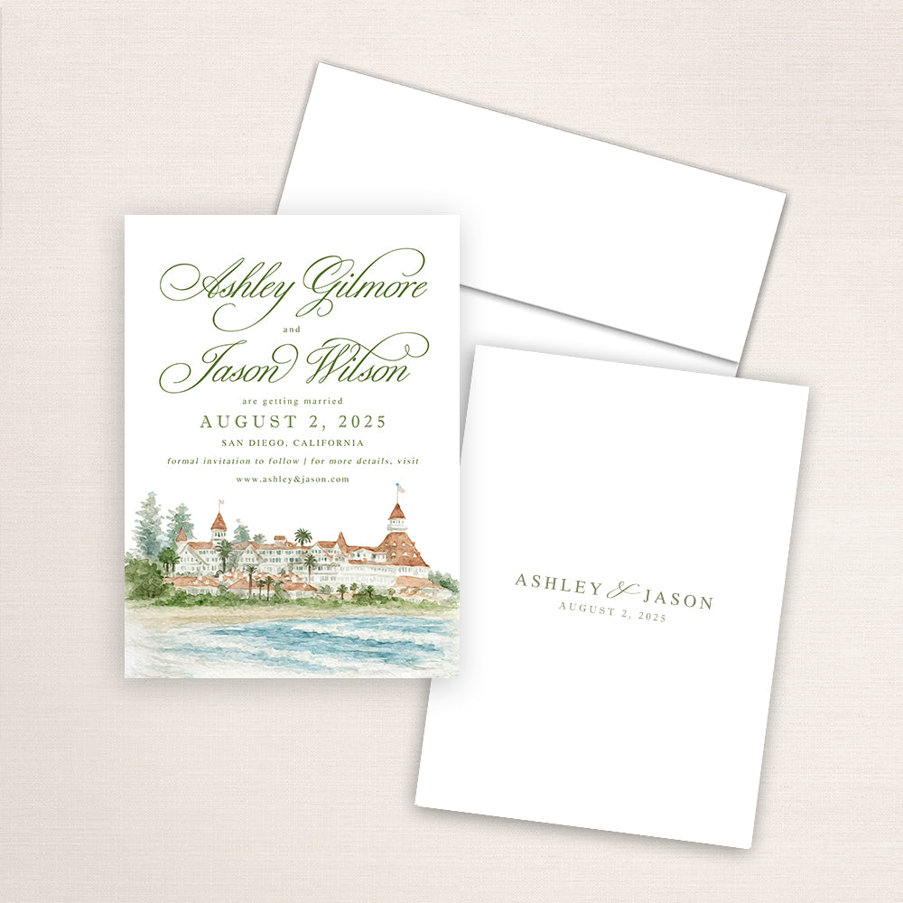 Hotel del Coronado wedding save the date featuring detailed watercolor artwork of the historic San Diego resort, refined script names, white envelope, and minimalist printed back with couple’s names and date.