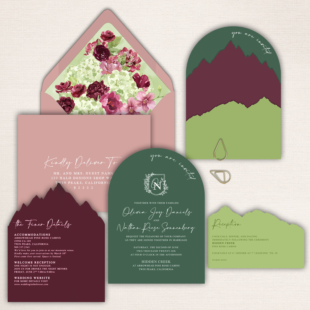 Custom mountain wedding invitation suite in burgundy, dark green, burgundy, blush pink and lime green or chartreuse with laser cut mountain-shaped cards, floral watercolor envelope liner, arched wedding invitation, details card and reception insert. Elegant modern design inspired by a mountain wedding venue destination wedding.