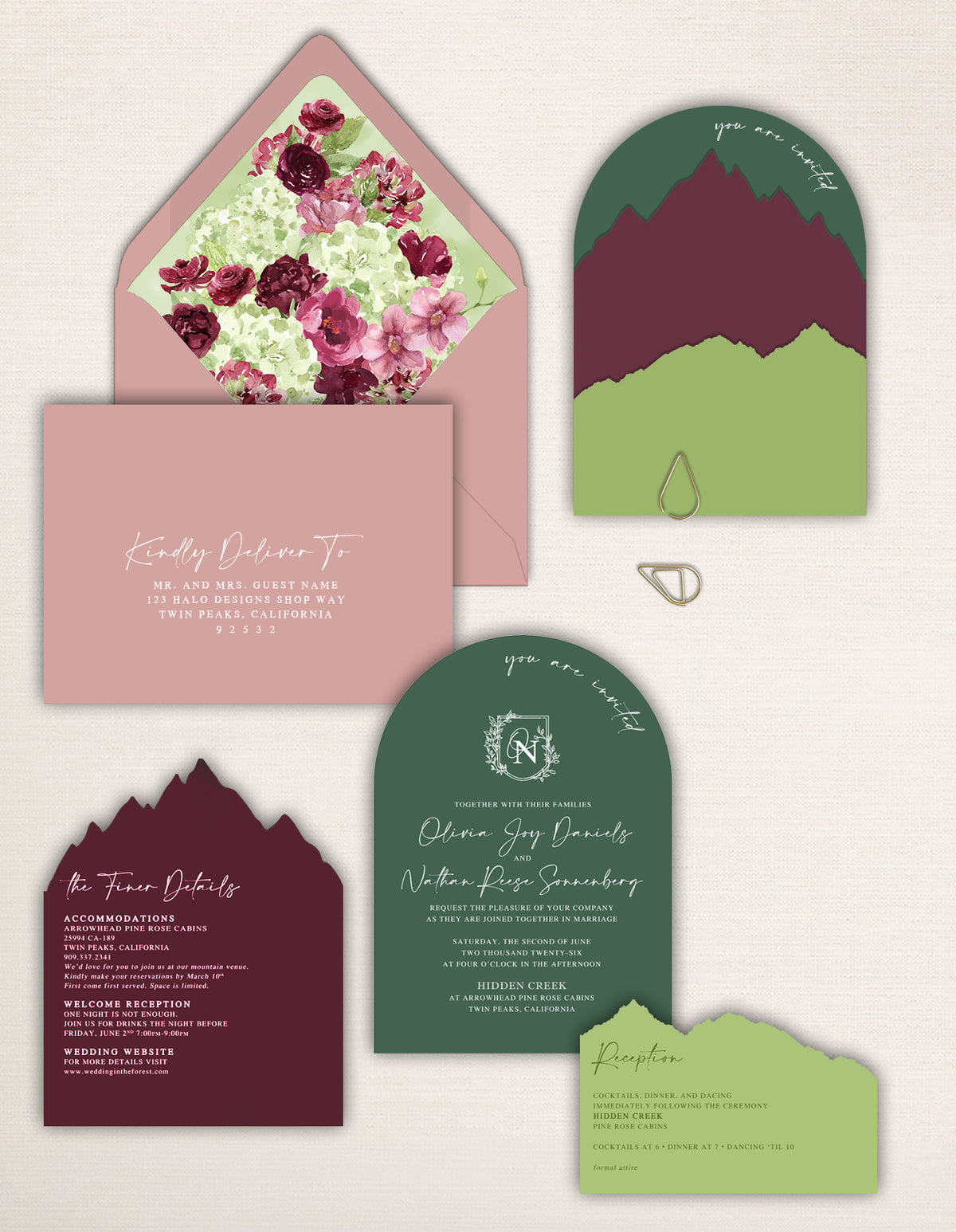 Burgundy, forest green and chartreuse mountain wedding invitation suite with watercolor floral envelope liner, laser cut mountain details, arched monogram invitation, reception card, details card and modern layered stationery.