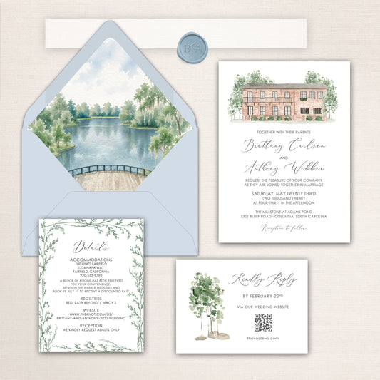 Elegant waterfront wedding invitation suite featuring a soft blue envelope with watercolor liner illustration of a serene lake and trees at Millstone at Adams Pond, formal invitation with venue illustration and romantic script typography, greenery-framed details card, and minimalist RSVP card with watercolor tree accent in soft blue, sage green, and neutral tones.