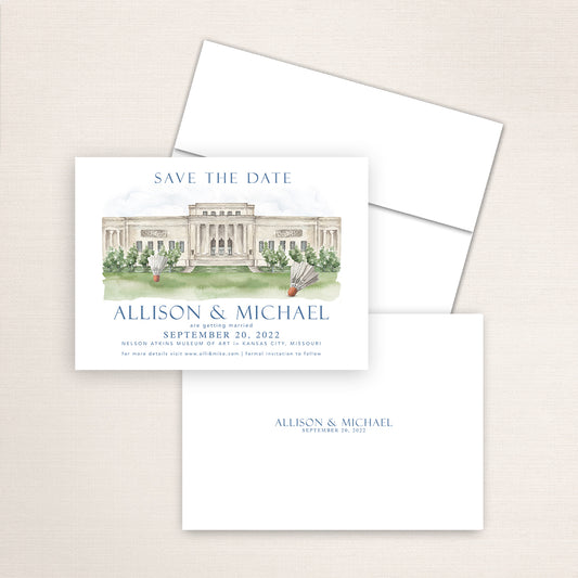 Nelson-Atkins Museum of Art save the date featuring a hand-painted watercolor illustration of the neoclassical museum façade with lawn and badminton shuttlecock sculptures in Kansas City, Missouri, elegant blue typography, and minimalist back with the couple’s names and wedding date.