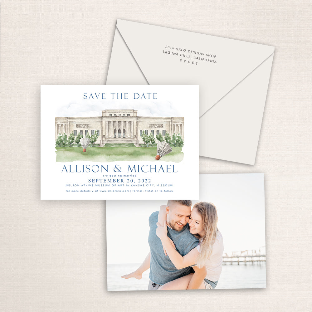 Nelson-Atkins Museum of Art wedding save the date with watercolor illustration of the Kansas City museum and iconic shuttlecock sculptures, coordinating envelope, refined blue typography, and engagement photo printed on the back.