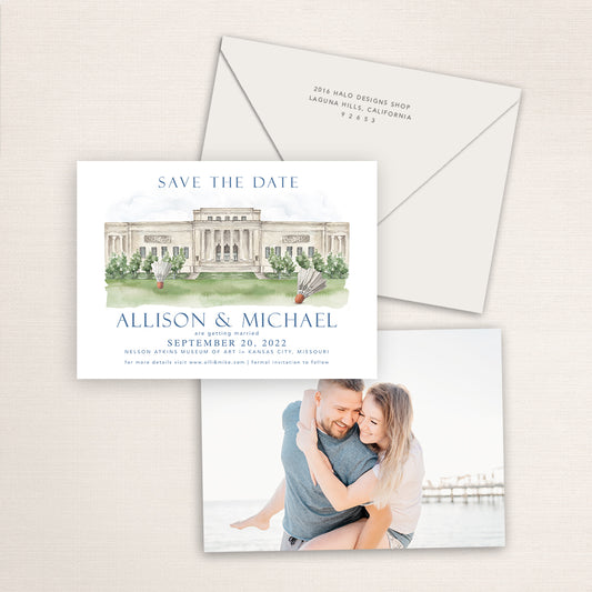 Nelson-Atkins Museum of Art wedding save the date with watercolor illustration of the Kansas City museum and iconic shuttlecock sculptures, coordinating envelope, refined blue typography, and engagement photo printed on the back.