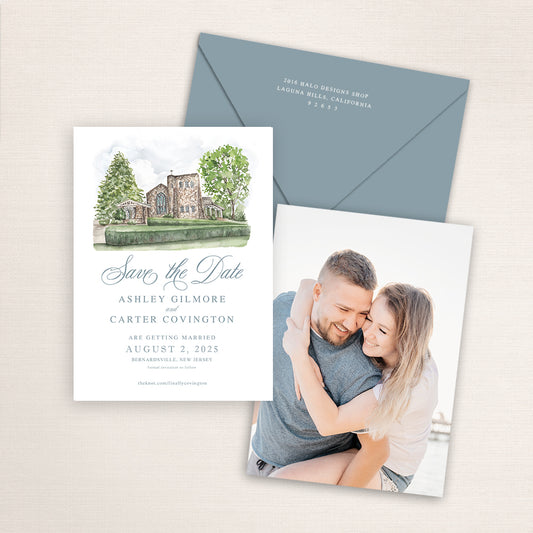 Our Lady of Perpetual Help wedding save the date with detailed watercolor church illustration in Bernardsville, New Jersey, coordinating blue envelope, refined script typography, and engagement photo printed on the back.