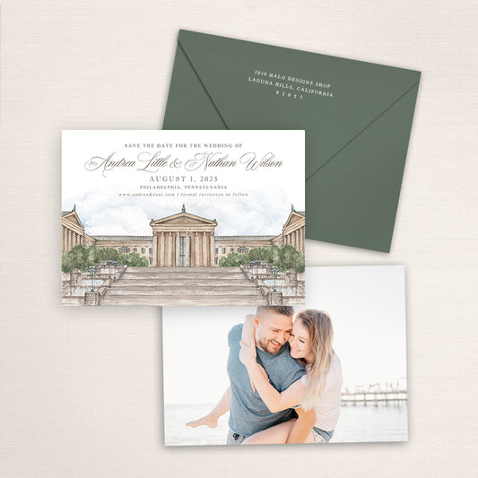 Philadelphia Museum of Art wedding save the date with detailed watercolor illustration of the historic museum and grand steps in Philadelphia, coordinating green envelope, refined calligraphy typography, and engagement photo printed on the back.