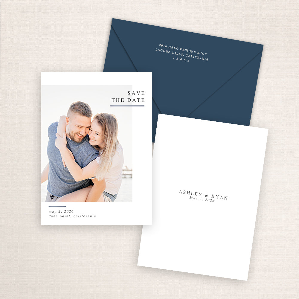 Elegant and simple save the date card with a navy envelope. The couple’s beach photo is paired with refined serif typography and clean white space, showcasing a timeless and modern design.