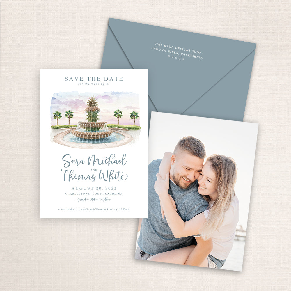 Wedding save the date cards featuring a watercolor of the Pineapple Fountain in Charleston, South Carolina. Includes a photo on the back and matching color envelopes.