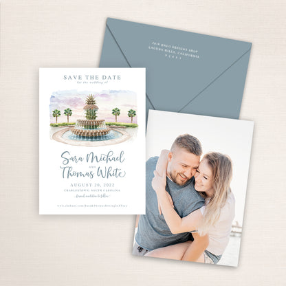 Wedding save the date cards featuring a watercolor of the Pineapple Fountain in Charleston, South Carolina. Includes a photo on the back and matching color envelopes.