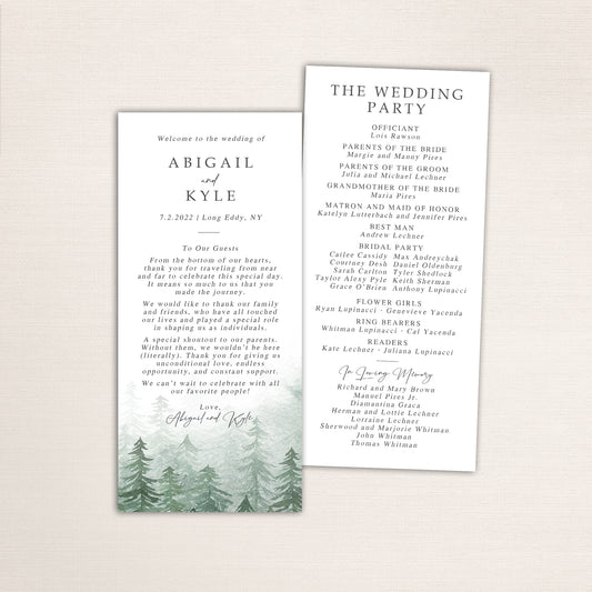 Slim wedding program cards with a watercolor of evergreen forest artwork  — featuring the ceremony order on one side and the the wedding party list on the reverse.