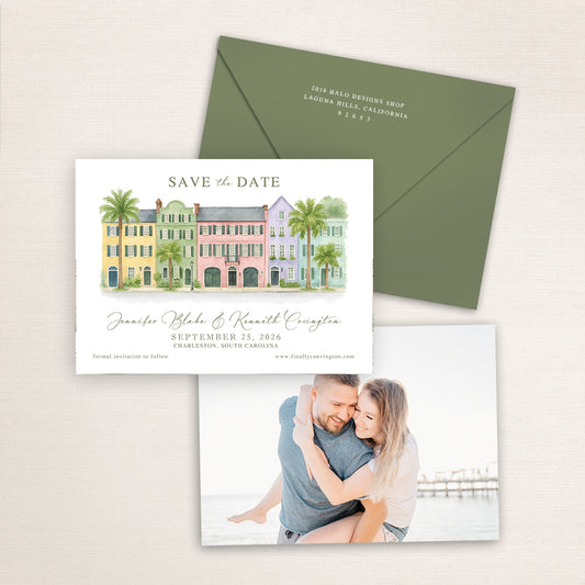 Rainbow Row Charleston save the date featuring a hand-painted watercolor illustration of the iconic pastel historic homes with palm trees, elegant script typography, olive green envelope, and engagement photo on the back.