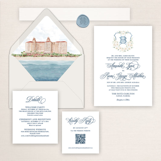 Watercolor wedding invitation suite inspired by The Ritz-Carlton Naples, featuring a hand-painted venue illustration on the envelope liner, a floral monogram white floral crest invitation, coordinating details and RSVP cards with blue accents, and a matching monogram wax seal.
