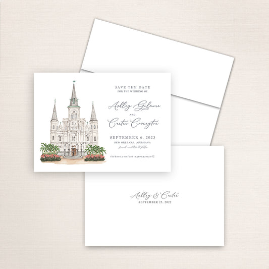 Custom watercolor Save the Date card featuring hand-painted venue illustration of Saint Louis Cathedral in New Orleans, Louisiana, personalized wedding stationery with elegant venue artwork. 