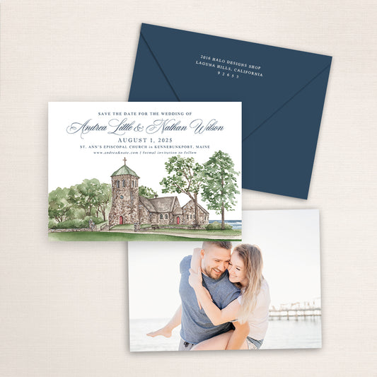 St. Ann’s Episcopal Church wedding save the date with a watercolor illustration of the seaside stone chapel in Kennebunkport, Maine, paired with a navy envelope, refined calligraphy typography, and an engagement photo of the couple printed on the back.