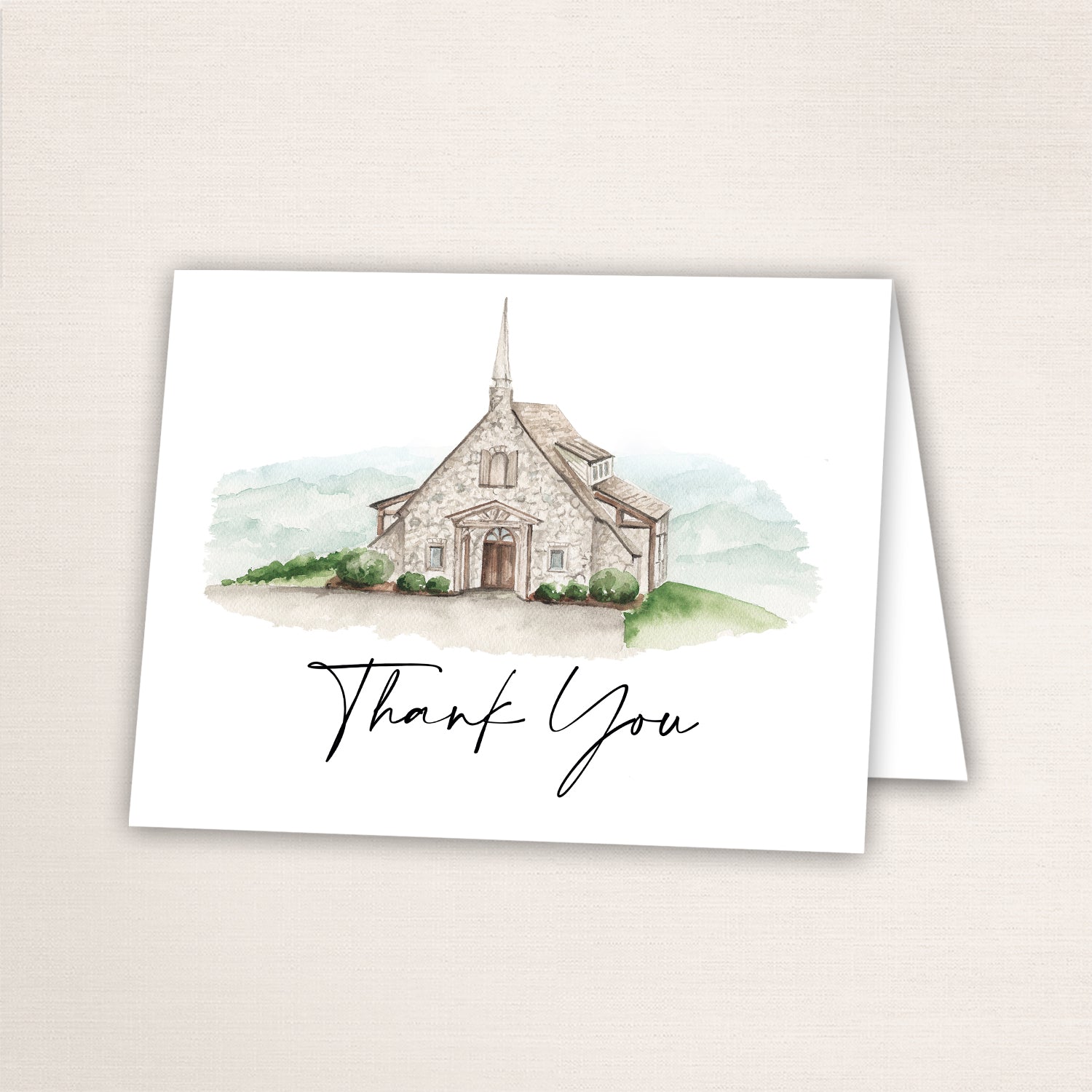 Folded thank you card featuring a hand-painted South Carolina wedding venue watercolor and “Thank You” text in script on the front.