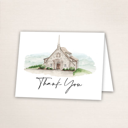 Folded thank you card featuring a hand-painted South Carolina wedding venue watercolor and “Thank You” text in script on the front.