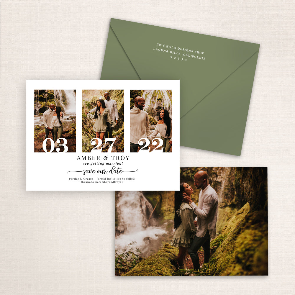 Three-photo save the date card featuring a couple walking through a lush forest near a waterfall. Each image displays part of the wedding date “03 27 22” in bold serif numbers, with couple names Amber and Troy below in elegant script and an olive green envelope in the background.